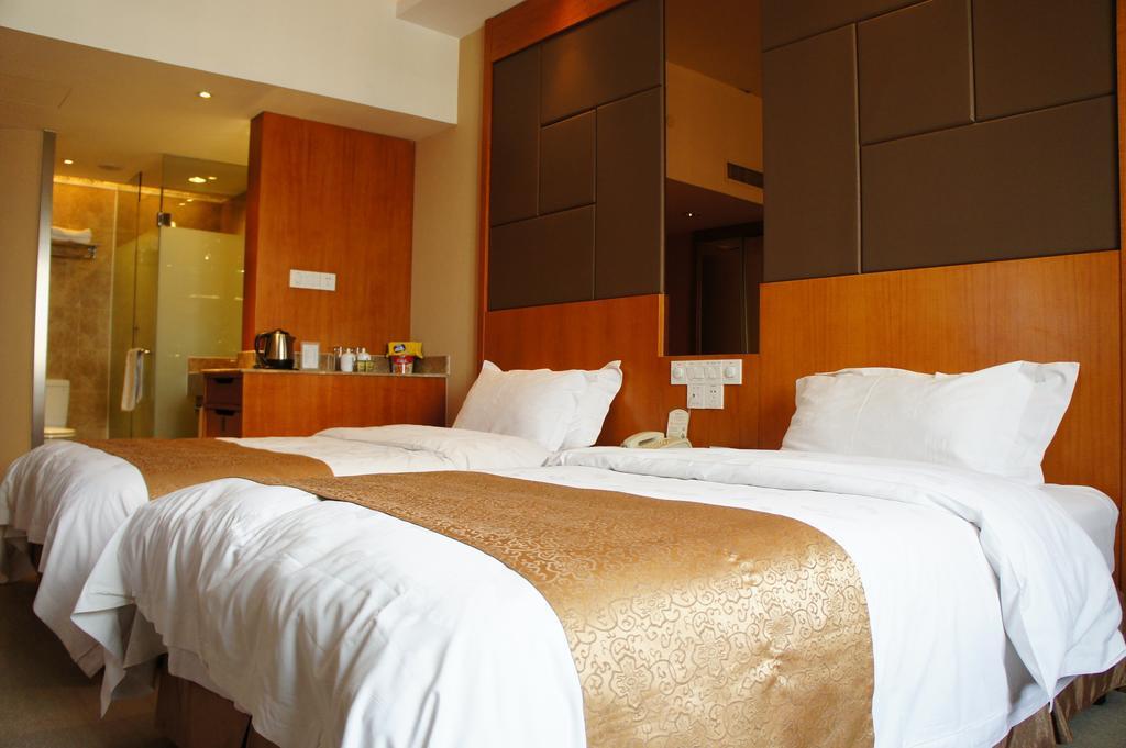 Oriental Hotel Tong Xiang Jiaxing Quarto foto