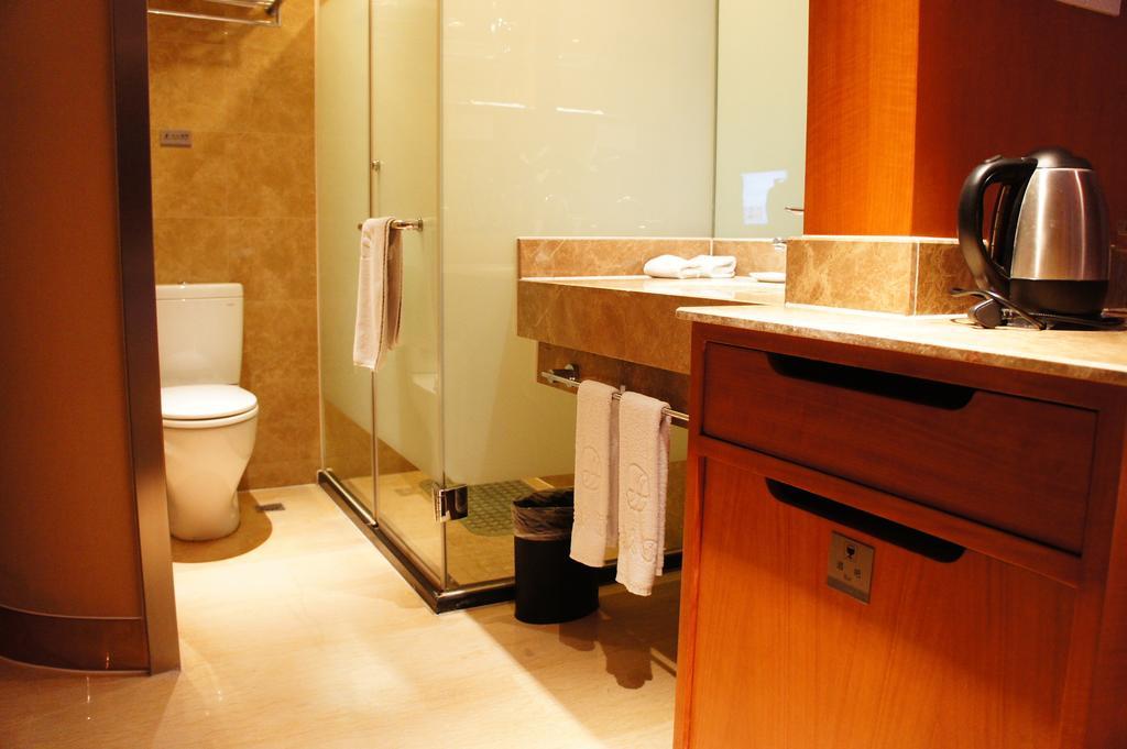 Oriental Hotel Tong Xiang Jiaxing Quarto foto